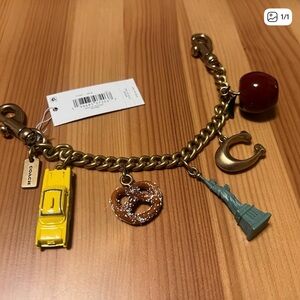 Coach Gold Charm Bracelet with NYC Themed Charms